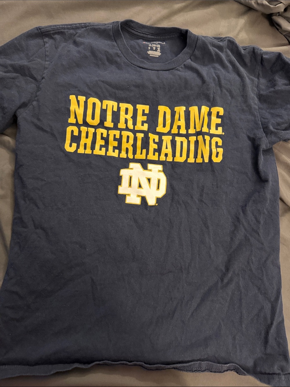 Champion Navy T-Shirt with Gold Notre Dame Cheerleading Logo
